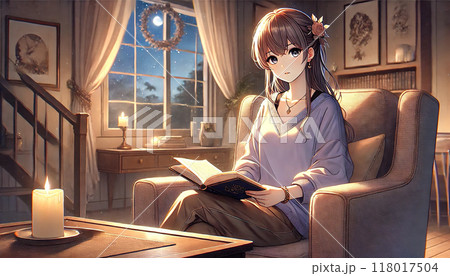 夜、椅子に座り本を読む女性 118017504