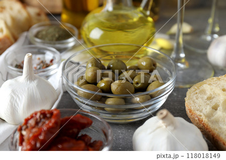 The concept of Italian cuisine, a plate with olives. The concept of Italian cuisine, a plate with olives. 118018149