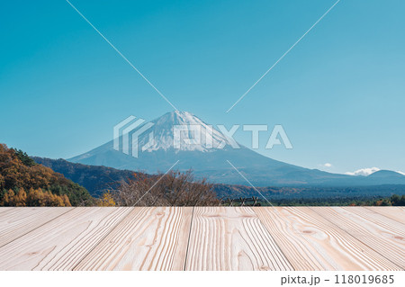 Empty wood table mockup with Mount Fuji view at Saiko Iyashino Sato Nenba background and copy space for text, Mock up for your product display and montage in autumn season. Japan travel and vacation Empty wood table mockup with Mount Fuji view at Saiko Iyashino Sato Nenba background and copy space for text, Mock up for your product display and montage in autumn season. Japan travel and vacation 118019685