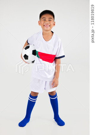 Portrait Asian smiling young boy kids holding soccer ball studio shot isolated white background, celebrating happy cute child player football, sport hobby for kids, leisure games Portrait Asian smiling young boy kids holding soccer ball studio shot isolated white background, celebrating happy cute child player football, sport hobby for kids, leisure games 118019819
