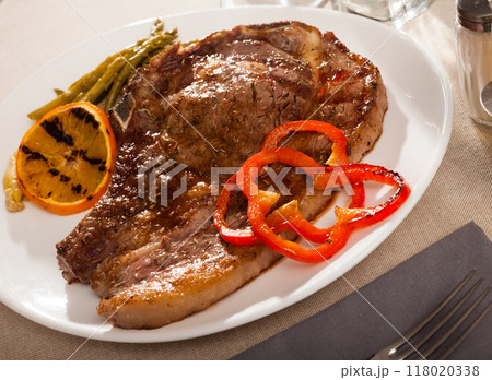 Entrecote with asparagus and orange Entrecote with asparagus and orange 118020338