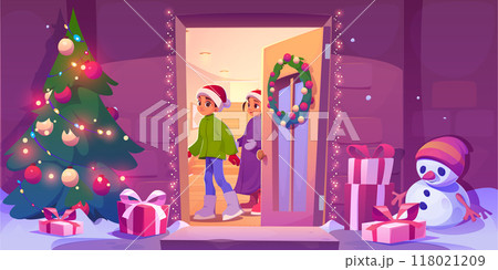 Children on house porch on Christmas eve 118021209