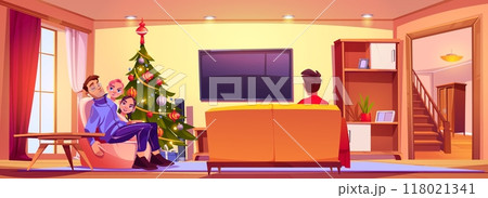 Family in living room with Christmas tree at home 118021341