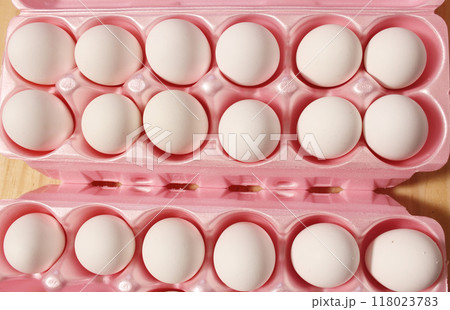 Carton of Fresh Chicken Eggs Close up on Table Carton of Fresh Chicken Eggs Close up on Table 118023783