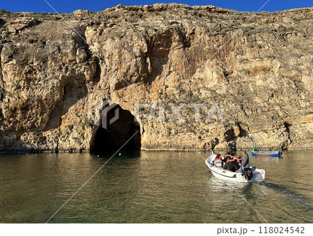 View of the cliffs on the island in Xlendi Bay on the island of Gozo Malta View of the cliffs on the island in Xlendi Bay on the island of Gozo Malta 118024542