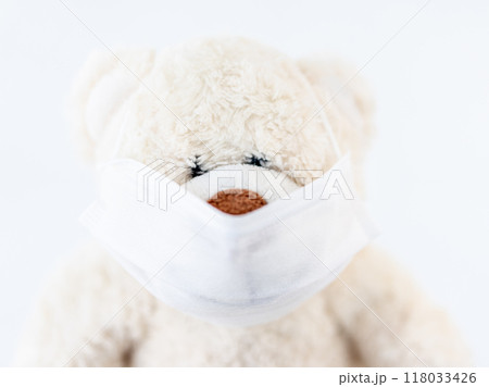 Teddy bear wearing medical mask Teddy bear wearing medical mask 118033426