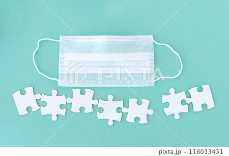 Medical mask and puzzle pieces Medical mask and puzzle pieces 118033431