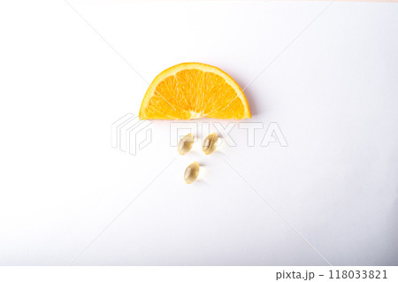 Vitamin C. Supplement capsules and orange. Soft vitamins capsule. Treatment and prevention of flu and colds, virus deseases. Healthcare concept banner. High quality photo Vitamin C. Supplement capsules and orange. Soft vitamins capsule. Treatment and prevention of flu and colds, virus deseases. Healthcare concept banner. High quality photo 118033821