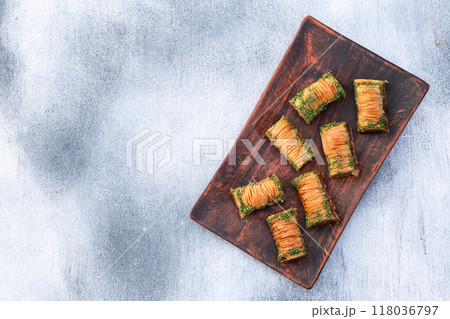 Traditional Turkish dessert baklava with walnut Traditional Turkish dessert baklava with walnut 118036797