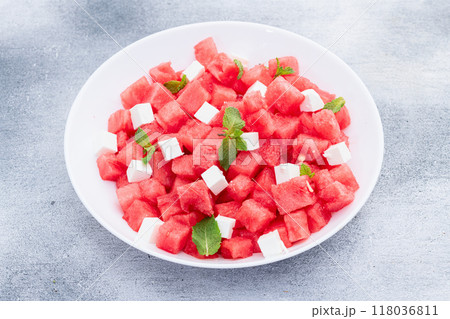 Summer watermelon salad with feta cheese and mint 118036811