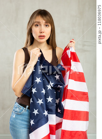 Female fan of USA team are upset by oss of their favorite team and express emotions 118036975