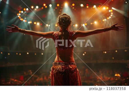 Enthralling belly dance at a vibrant Middle Eastern restaurant with traditional music and decor. 118037358