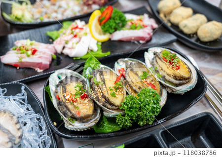 Korean seafood dishes. Grilled abalone shell Korean seafood dishes. Grilled abalone shell 118038786