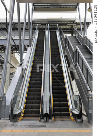double escalator staircase leading up. double escalator staircase leading up. 118041129