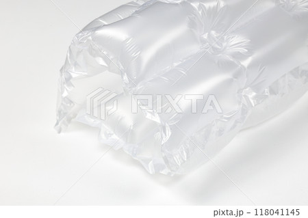 Close up plastic translucent air packaging, Plastic translucent packaging with air cushion. Inflatable air bag isolated on white background. Close up plastic translucent air packaging, Plastic translucent packaging with air cushion. Inflatable air bag isolated on white background. 118041145