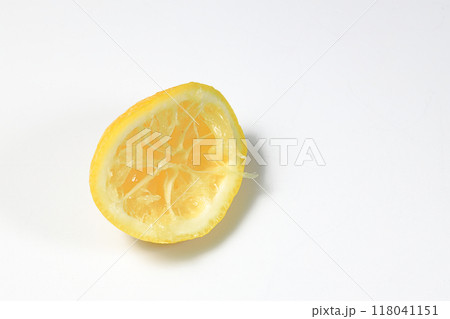 Fresh squeezed lemon fruit isolated on white background. Fresh squeezed lemon fruit isolated on white background. 118041151