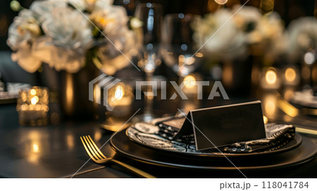 A beautifully arranged dining table features exquisite plates and elegant floral centerpieces, illuminated by soft candlelight, creating a warm evening atmosphere A beautifully arranged dining table features exquisite plates and elegant floral centerpieces, illuminated by soft candlelight, creating a warm evening atmosphere 118041784