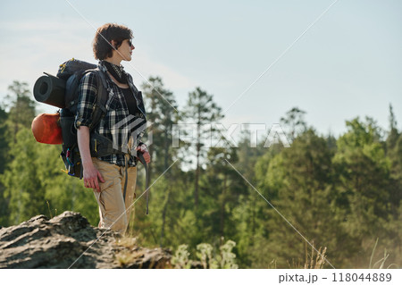 Female hiker admiring natural scenery Female hiker admiring natural scenery 118044889
