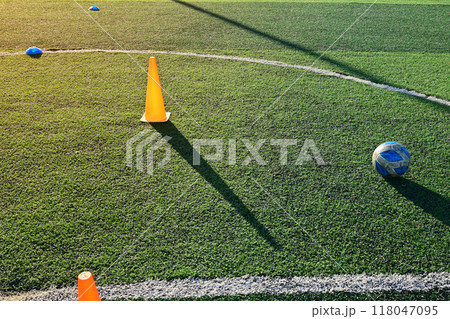 artificial green grass soccer field with training cone and ball artificial green grass soccer field with training cone and ball 118047095