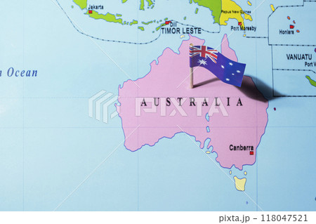 A map of Australia with an Australian flag on it A map of Australia with an Australian flag on it 118047521