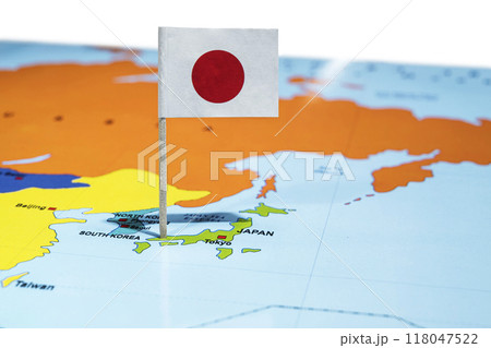 A map of Japan with a Japanese flag on it A map of Japan with a Japanese flag on it 118047522