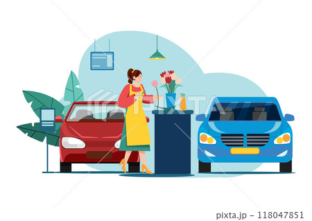 Woman with flowers in a car showroom Woman with flowers in a car showroom 118047851