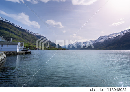 Tranquil Fjord Village Nestled Among Mountains. Tranquil Fjord Village Nestled Among Mountains. 118048081