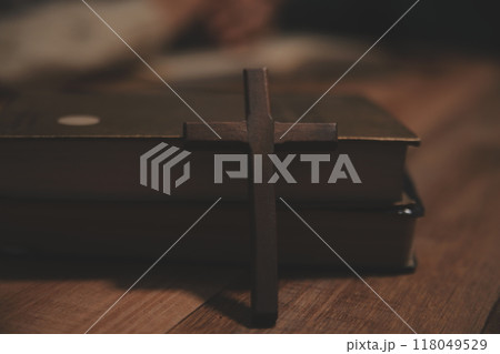 Christian group are praying to god with the bible and sharing the gospel. Concept of faith for god. 118049529