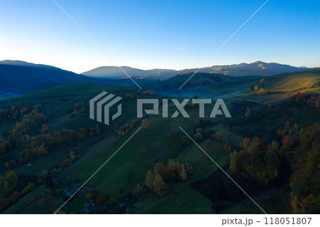 Aerial view of autumn countryside landscape in a misty morning Aerial view of autumn countryside landscape in a misty morning 118051807