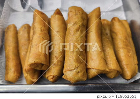 Homemade Deep Fried Spring Rolls with a golden-brown crust Homemade Deep Fried Spring Rolls with a golden-brown crust 118052653