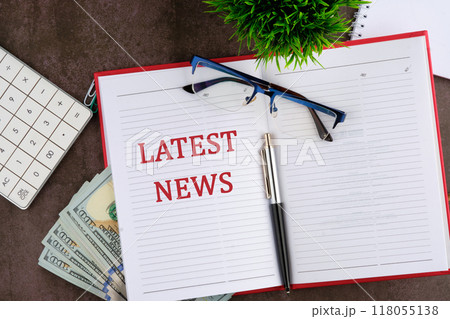 Conceptual latest news symbol. Copy space. LATEST NEWS message written there is an important text in the business book Conceptual latest news symbol. Copy space. LATEST NEWS message written there is an important text in the business book 118055138