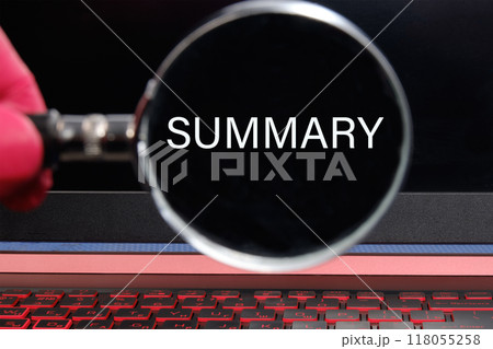 Conceptual summary word symbol. Copy space. Summary word written through a magnifying glass on a black monitor background Conceptual summary word symbol. Copy space. Summary word written through a magnifying glass on a black monitor background 118055258