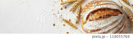 A freshly baked bread loaf, made with wheat flour, sits on a white background, surrounded by golden wheat stalks. Generative AI 118055768