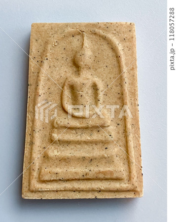 Thai old buddha amulet on the background Thai old buddha amulet on the background 118057288