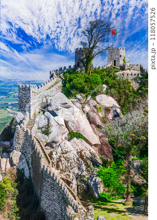Sintra, Portugal. Aerial top view of medieval moorish Castelo dos Mouros, world heritage place next to Lisbon. Sintra, Portugal. Aerial top view of medieval moorish Castelo dos Mouros, world heritage place next to Lisbon. 118057526
