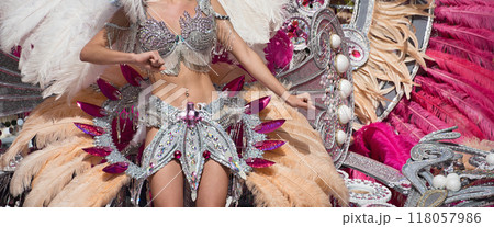 A woman in costume dancing on carnival A woman in costume dancing on carnival 118057986