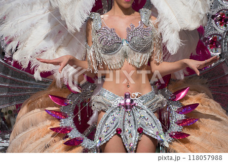 A woman in costume dancing on carnival A woman in costume dancing on carnival 118057988