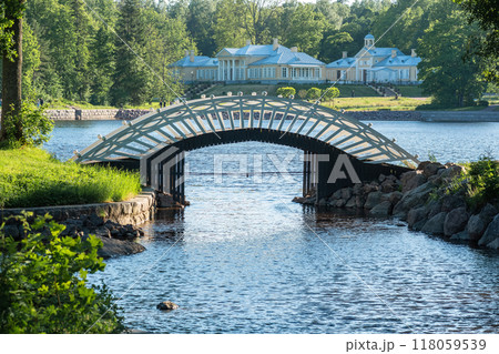 arched wooden pedestrian bridge in the park Monrepos in Vyborg arched wooden pedestrian bridge in the park Monrepos in Vyborg 118059539