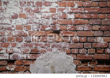 A white brick and orange brick wall. A orange painted old brick wall background A white brick and orange brick wall. A orange painted old brick wall background 118060961