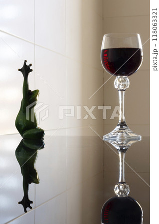 Meditating with red wine Meditating with red wine 118063321