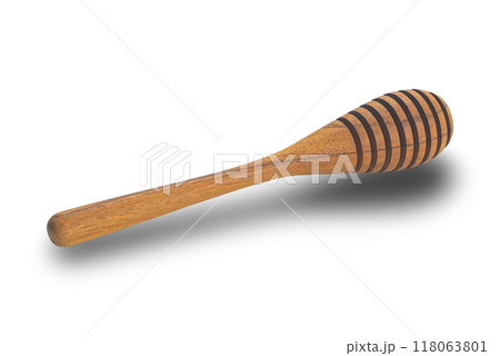 High angle view of single wooden honey dipper. 118063801
