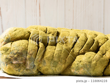 Bread with bacterium of mold . Macro photography 118064228