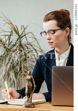 business woman lawyer working on labor law in office reflections corporate lawyer with legal advice business woman lawyer working on labor law in office reflections corporate lawyer with legal advice 118066181