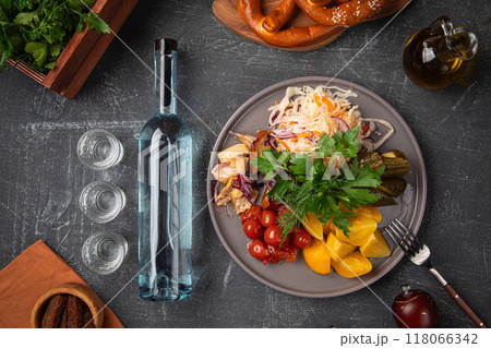 Russian appetizer with pickles and vodka 118066342