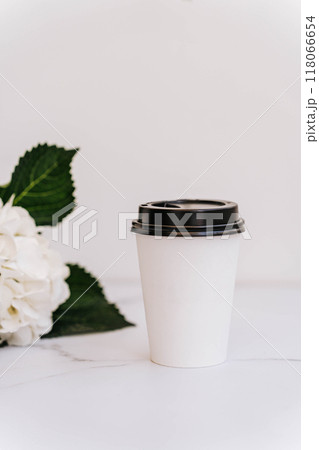 Paper Cup of coffee on wooden wall background 118066654