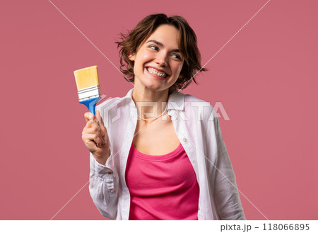 Pretty Smiling Woman Artist Painting With Brush On Pink.creative Person, Fantasy 118066895