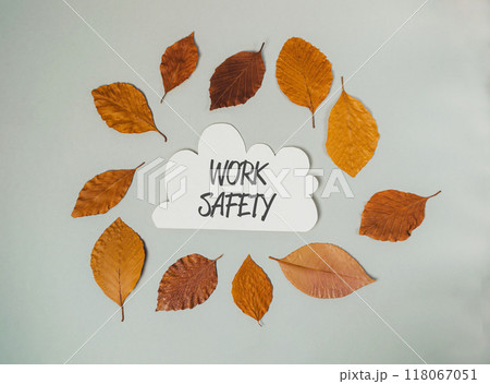 A leafy circle with the words work safety written in the center A leafy circle with the words work safety written in the center 118067051