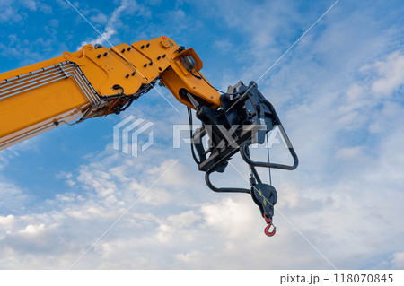A lifting mechanism with a hook at the end of the boom of a heavy truck crane A lifting mechanism with a hook at the end of the boom of a heavy truck crane 118070845
