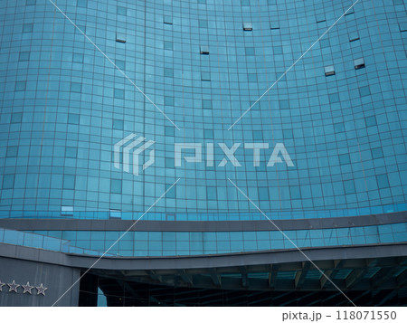 Windows of a modern hotel. Mirrored blue windows. Architecture pattern. 118071550