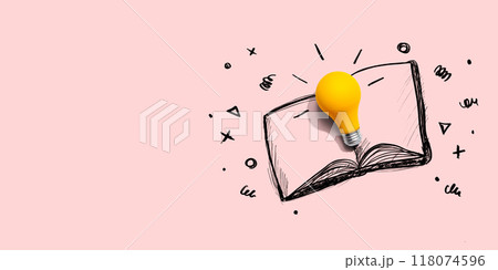 An open book with a lightbulb 118074596